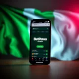 Smartphone displaying BetPawa app interface with Nigerian flag in the background